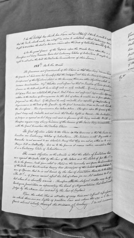Legal opinion on merits of land tenure dispute involving Demesne lands and customary estates
